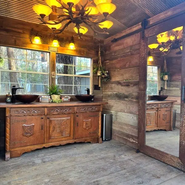 Rustic shed interior with wood paneling and ambient lighting